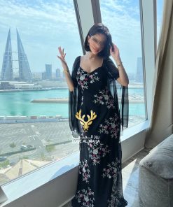 روز المها - فستان أسود أنيق مورد بأكمام شفافه