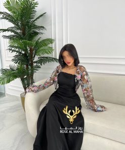 روز المها - فستان باربي بجاكيت ترتر مشجر