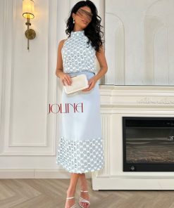 جولينا - طقم سماوي ناعم بتفاصيل بارزه وقصة مستقيمة