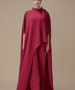 اكتان - طقم جمبسوت فوشي بقصة انسيابية وتطريز كريستالي