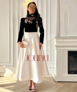 جولينا - طقم اسود مطرز ذهبي بتنورة سكرية