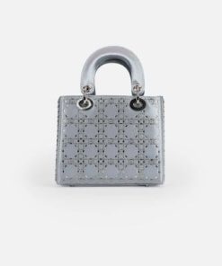 أوبرا فاشن - شنطة سهرة ملكيه بنقشة هندسية لون فضي