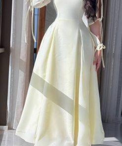 روز المها - فستان عيد ليموني