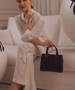 الفي - شنطة نسائية كلاسيك جلد بلون أسود