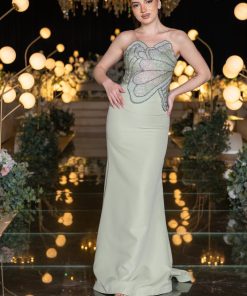 لورا فاشن - فستان سهرة أخضر فاتح بتطريز لامع وتصميم راقٍ