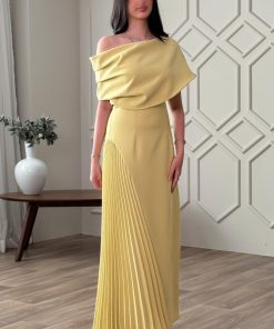 اكتان - فستان ماكسي بكسرات جانبية لون اصفر