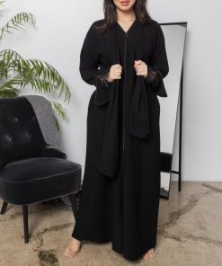 Alternative view of أمول - عباية سوداء سادة زوم بسحاب وجيوب مخفية وموديل اخر بطقطق ومن دون جيوب مخفيه بكم دانتيل مطرز 4001