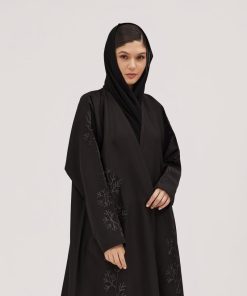 عبايات سوروزيه - عبايات لف سوداء كتان نص كلوش بتطريز هاري مشجر