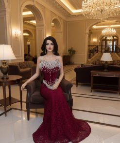 أزياء الأميرة - فستان سهرة نسائي انيق وراقي خمري فاخر بتطريز لؤلؤ