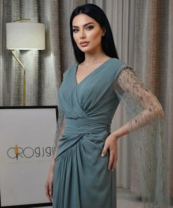 فستان اخضر كسرات كم شك