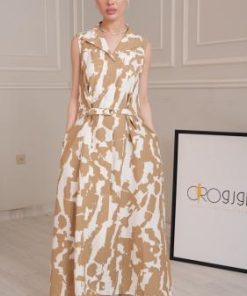 فستان ميدي بيج وأبيض بإطلالة أنثوية أنيقة