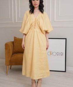 فستان أصفر بكم منفوخ - إطلالة فخمة