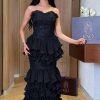 كنوا للملابس - فستان أسود جورجيت مع دانتيل فاخر – طبقات أنثوية بإطلالة ساحرة