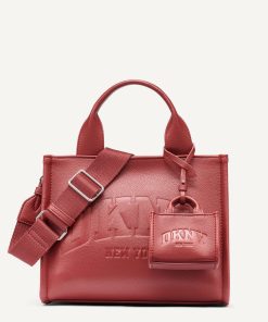 DKNY - حقيبة "DKNY" اليومية: أناقة انسيابية وعملية لا تُضاهى.