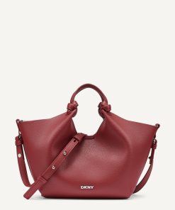DKNY - حقيبة DKNY Paula Commuter الصغيرة: مزيج مثالي بين التصميم الراقي والعملية اليومية.