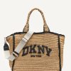 DKNY - ارتقي بإطلالتك الصيفية مع حقيبة DKNY "هادلي" المتوسطة باللون البيج – أناقة عملية مصنوعة من الورق المتين بنسبة 100%.